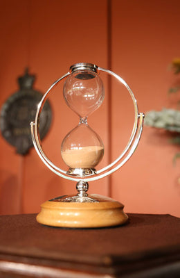 This Day-Impex hand blown hourglass sand timer was presented by King Charles
